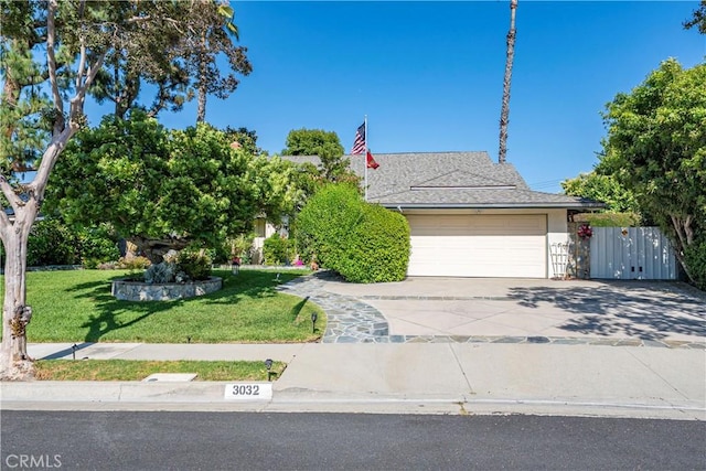 3032 Pietro Dr, Hacienda Heights, CA 91745 - view of property hidden behind natural elements featuring an attached garage, concrete driveway, and stucco siding