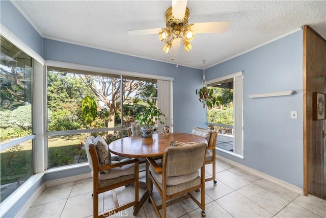 3032 Pietro Dr, Hacienda Heights, CA 91745 - dining space featuring a textured ceiling, crown molding, light tile patterned floors, and ceiling fan