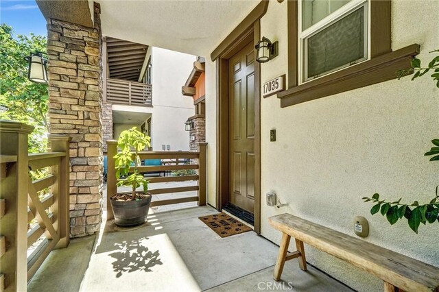 17035 Independence Way, Yorba Linda, CA 92886 - view of exterior entry featuring stucco siding and a porch
