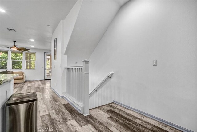 17035 Independence Way, Yorba Linda, CA 92886 - stairway with wood finished floors, ceiling fan, and recessed lighting