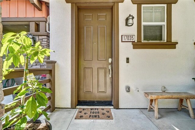 17035 Independence Way, Yorba Linda, CA 92886 - property entrance featuring stucco siding and a porch