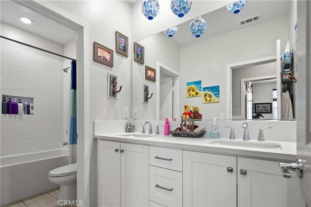 26957 Winding Trail Ct, Valencia, CA 91381 - full bath with double vanity, shower / bath combo, and tile patterned flooring