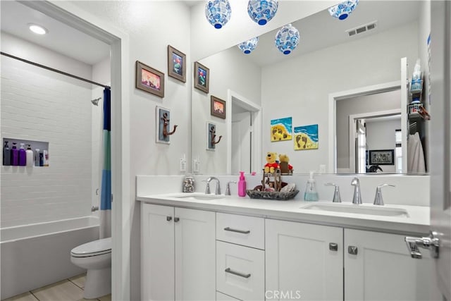 26957 Winding Trail Ct, Valencia, CA 91381 - full bathroom with double vanity, shower / bath combo, and tile patterned floors