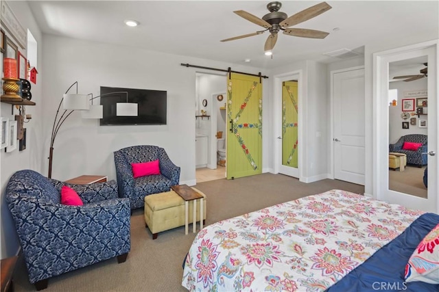 26957 Winding Trail Ct, Valencia, CA 91381 - carpeted bedroom with a barn door, recessed lighting, and ceiling fan