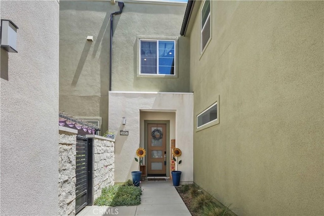 26957 Winding Trail Ct, Valencia, CA 91381 - property entrance with stucco siding