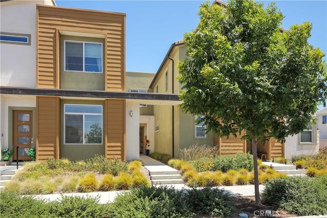 26957 Winding Trail Ct, Valencia, CA 91381 - view of front of home featuring stucco siding