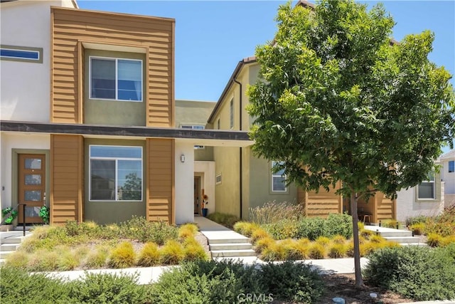 26957 Winding Trail Ct, Valencia, CA 91381 - view of front of home with stucco siding