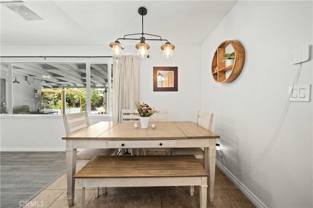 44055 Elm Ave, Lancaster, CA 93534 - tiled dining room featuring baseboards