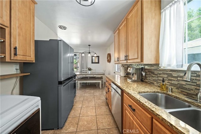 44055 Elm Ave, Lancaster, CA 93534 - kitchen with plenty of natural light, stainless steel appliances, backsplash, and light tile patterned flooring