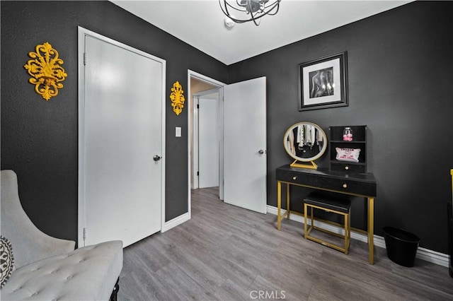 44055 Elm Ave, Lancaster, CA 93534 - living area featuring wood finished floors and baseboards