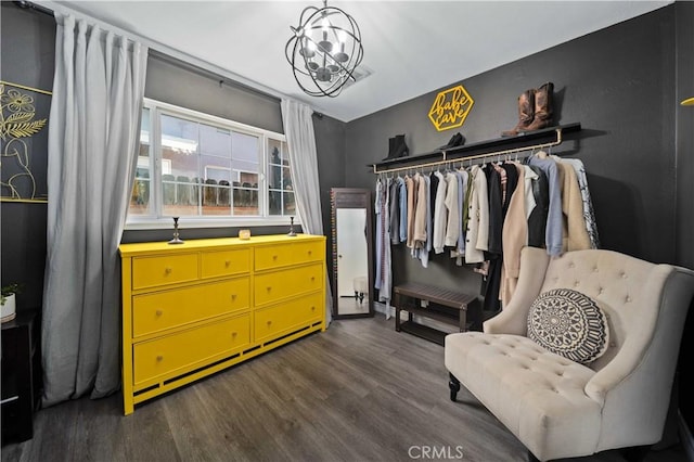 44055 Elm Ave, Lancaster, CA 93534 - spacious closet featuring a chandelier and dark wood-style flooring