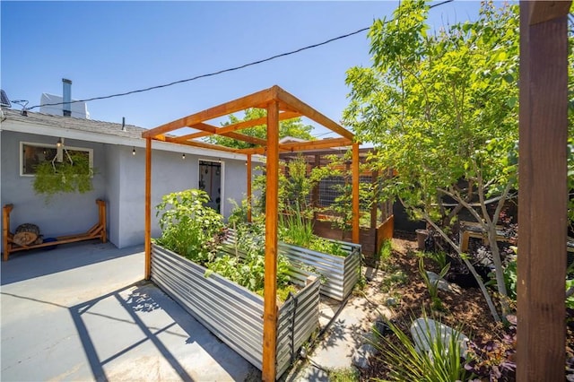 44055 Elm Ave, Lancaster, CA 93534 - view of patio / terrace featuring a vegetable garden