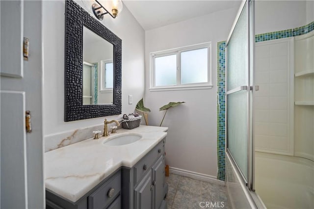 44055 Elm Ave, Lancaster, CA 93534 - bathroom featuring vanity and shower / bath combination with glass door
