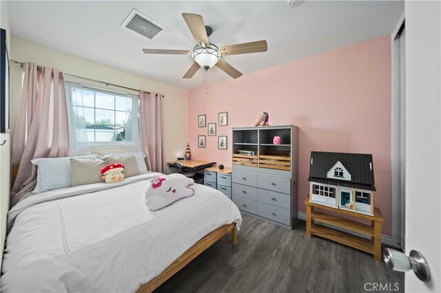44055 Elm Ave, Lancaster, CA 93534 - bedroom with dark wood-style flooring and ceiling fan