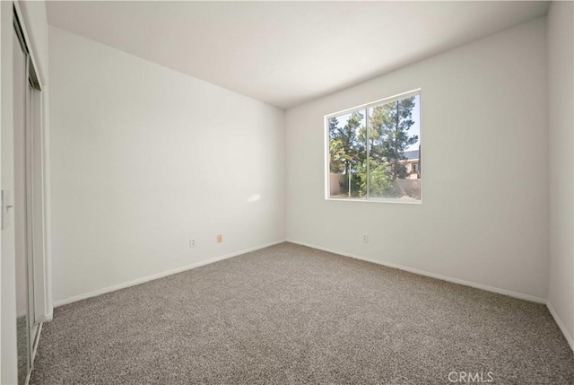 40225 Watford Way, Palmdale, CA 93551 - unfurnished bedroom featuring carpet and a closet