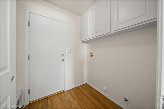 40225 Watford Way, Palmdale, CA 93551 - laundry area featuring cabinet space, hookup for a washing machine, and light wood finished floors