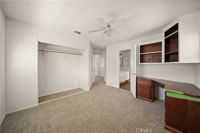 40225 Watford Way, Palmdale, CA 93551 - unfurnished bedroom featuring carpet flooring, a closet, a ceiling fan, and ensuite bathroom