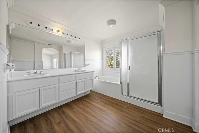 40225 Watford Way, Palmdale, CA 93551 - full bathroom with a garden tub, double vanity, a shower stall, wood finished floors, and ornamental molding