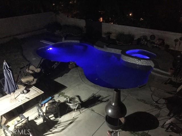 40225 Watford Way, Palmdale, CA 93551 - view of pool featuring a pool with connected hot tub, a fenced backyard, and a patio