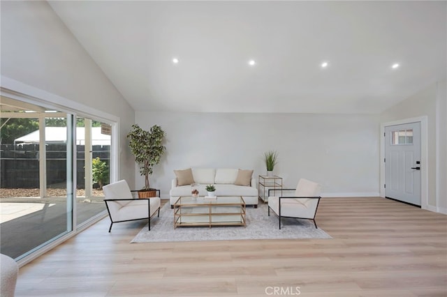 1478 N Park Ave, Pomona, CA 91768 - living room featuring light wood-type flooring, high vaulted ceiling, and recessed lighting