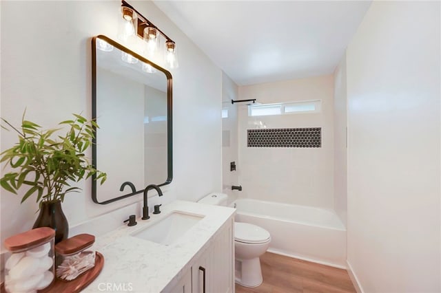 1478 N Park Ave, Pomona, CA 91768 - full bath with vanity, wood finished floors, and washtub / shower combination