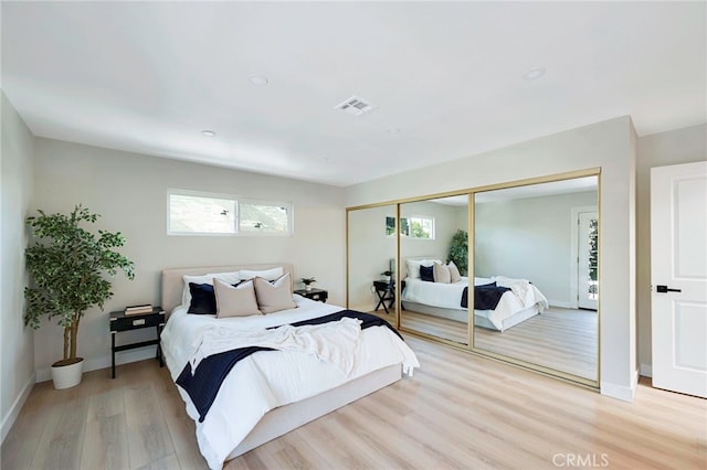 1478 N Park Ave, Pomona, CA 91768 - bedroom with light wood finished floors and a closet