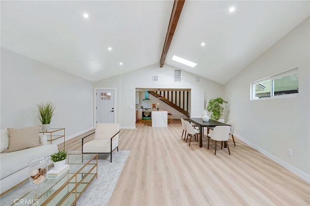 1478 N Park Ave, Pomona, CA 91768 - living area featuring stairs, light wood finished floors, recessed lighting, and a skylight