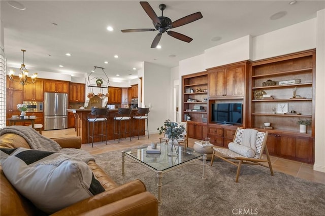 4368 Crown Ranch Rd, Corona, CA 92881 - living room with light tile patterned floors, recessed lighting, ceiling fan, and a chandelier