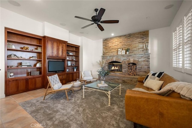 4368 Crown Ranch Rd, Corona, CA 92881 - living room with a ceiling fan, a stone fireplace, and light tile patterned floors