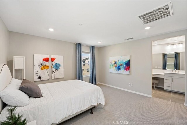 27753 Dyer Way, Canyon Country, CA 91387 - bedroom featuring light colored carpet, recessed lighting, ensuite bathroom, and built in study area