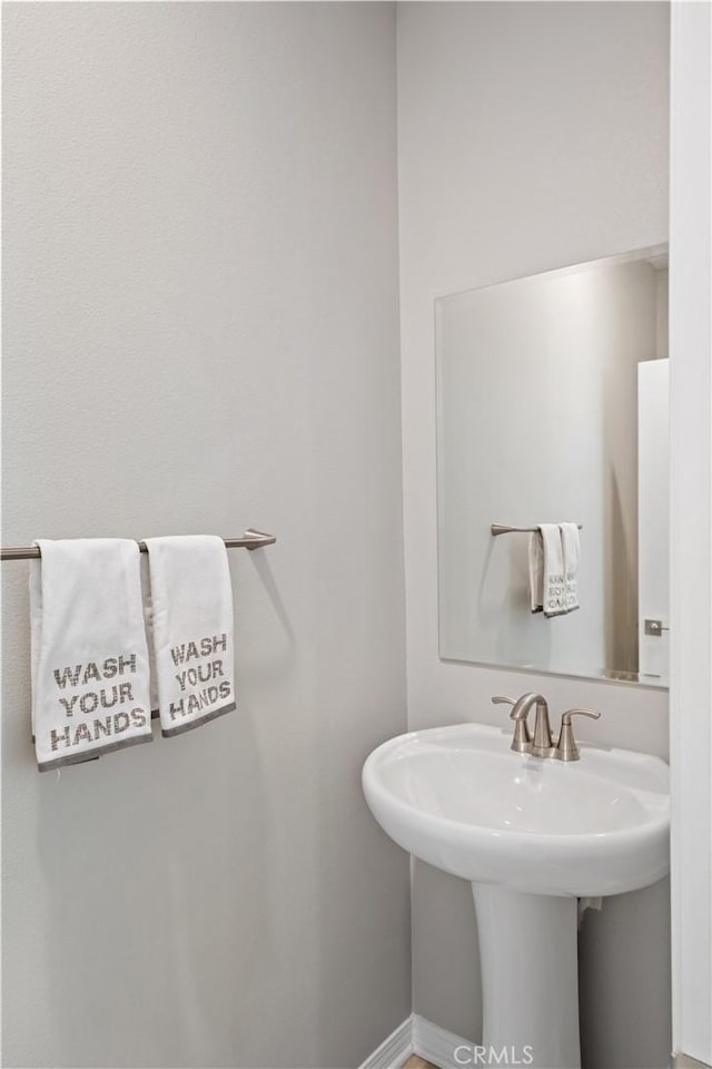 27753 Dyer Way, Canyon Country, CA 91387 - bathroom with a sink and baseboards