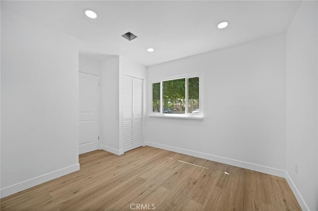 7848 Chastain Ave, Reseda, CA 91335 - spare room with wood finished floors and recessed lighting