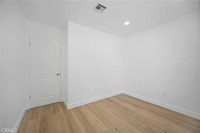 7848 Chastain Ave, Reseda, CA 91335 - empty room with light wood finished floors and recessed lighting