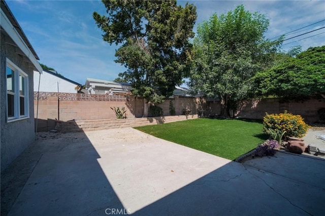 7848 Chastain Ave, Reseda, CA 91335 - fenced backyard featuring a patio