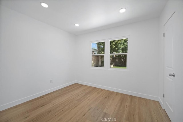 7848 Chastain Ave, Reseda, CA 91335 - unfurnished room with light wood-style flooring and recessed lighting