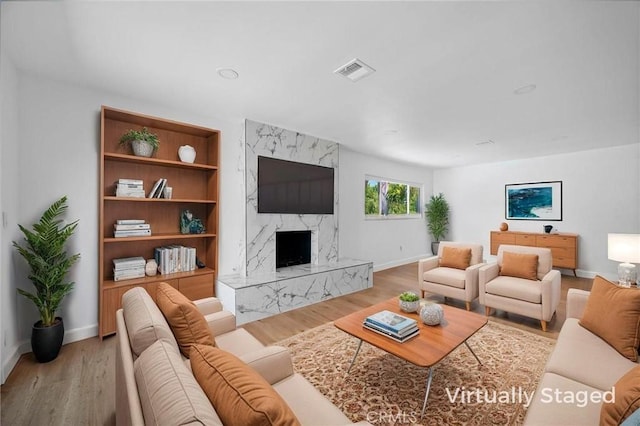 7848 Chastain Ave, Reseda, CA 91335 - living room with wood finished floors and a fireplace