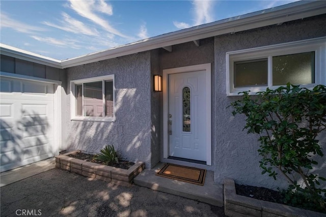 7848 Chastain Ave, Reseda, CA 91335 - property entrance with stucco siding and an attached garage