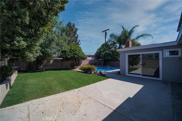 7848 Chastain Ave, Reseda, CA 91335 - fenced backyard featuring a patio area