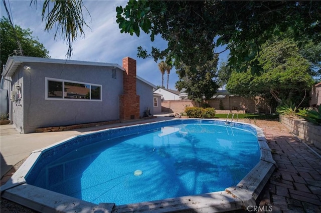 7848 Chastain Ave, Reseda, CA 91335 - view of pool with a fenced backyard and a patio
