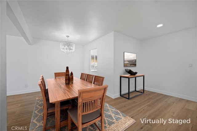 7848 Chastain Ave, Reseda, CA 91335 - dining space featuring light wood-style flooring, a chandelier, and recessed lighting