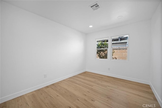 7848 Chastain Ave, Reseda, CA 91335 - empty room featuring light wood-style flooring and recessed lighting