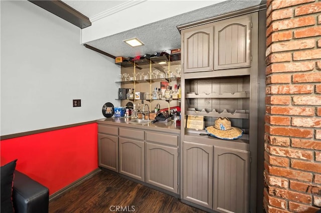 42903 Normandy Ln, Lancaster, CA 93536 - indoor wet bar featuring dark wood-type flooring