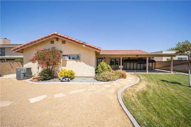 42903 Normandy Ln, Lancaster, CA 93536 - view of front of house with a tiled roof and stucco siding