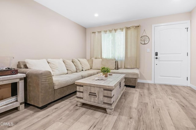 20224 Cohasset St Unit 12, Winnetka, CA 91306 - living area with light wood finished floors and recessed lighting