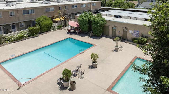 20224 Cohasset St Unit 12, Winnetka, CA 91306 - community pool featuring a patio