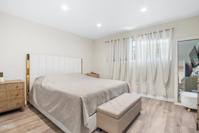 20224 Cohasset St Unit 12, Winnetka, CA 91306 - bedroom with light wood finished floors and recessed lighting