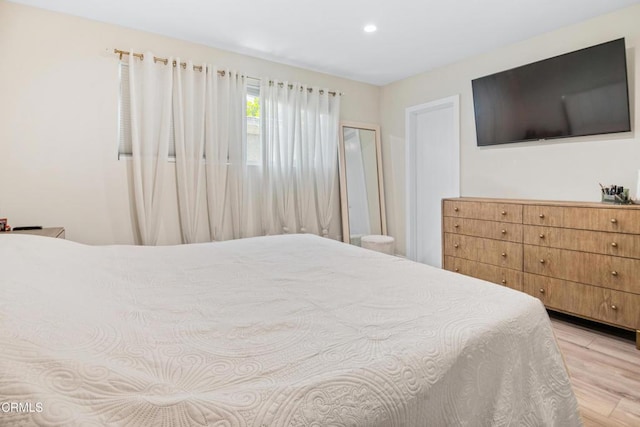 20224 Cohasset St Unit 12, Winnetka, CA 91306 - bedroom with wood finished floors and recessed lighting