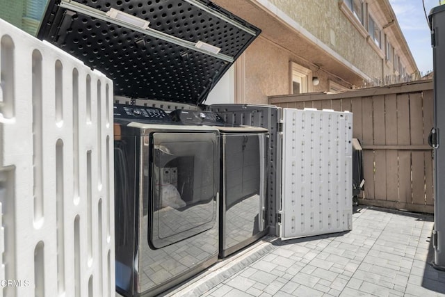 20224 Cohasset St Unit 12, Winnetka, CA 91306 - view of patio with washer and dryer