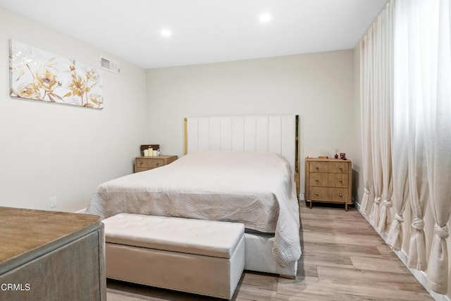 20224 Cohasset St Unit 12, Winnetka, CA 91306 - bedroom with light wood-style floors and recessed lighting