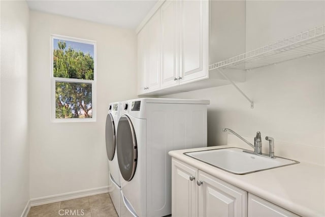 2 Tarascon, Newport Coast, CA 92657 - washroom with cabinet space, separate washer and dryer, and light tile patterned flooring